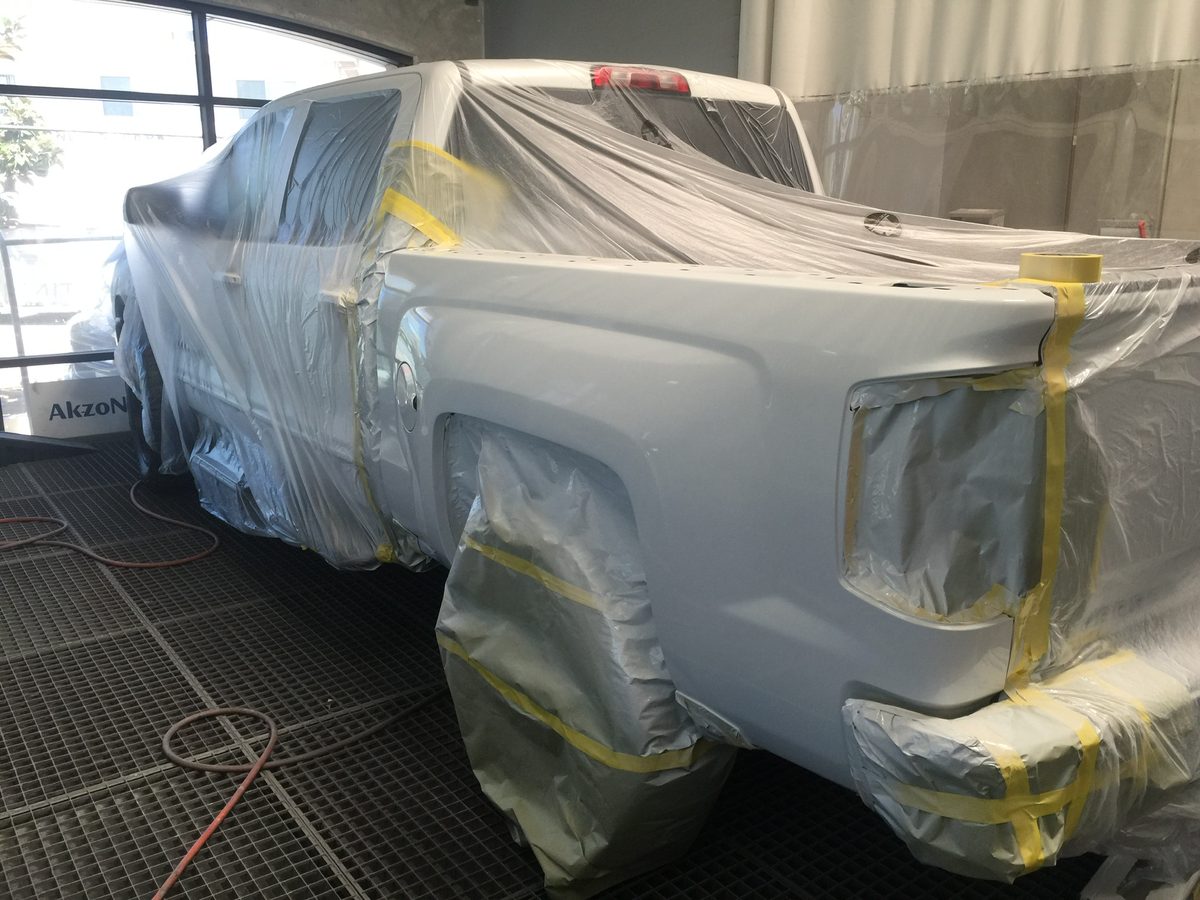 Truck masked for paint refinishing in the BumperDoc Santee booth